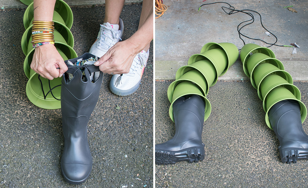 A person attaching the feet to the scarecrow.