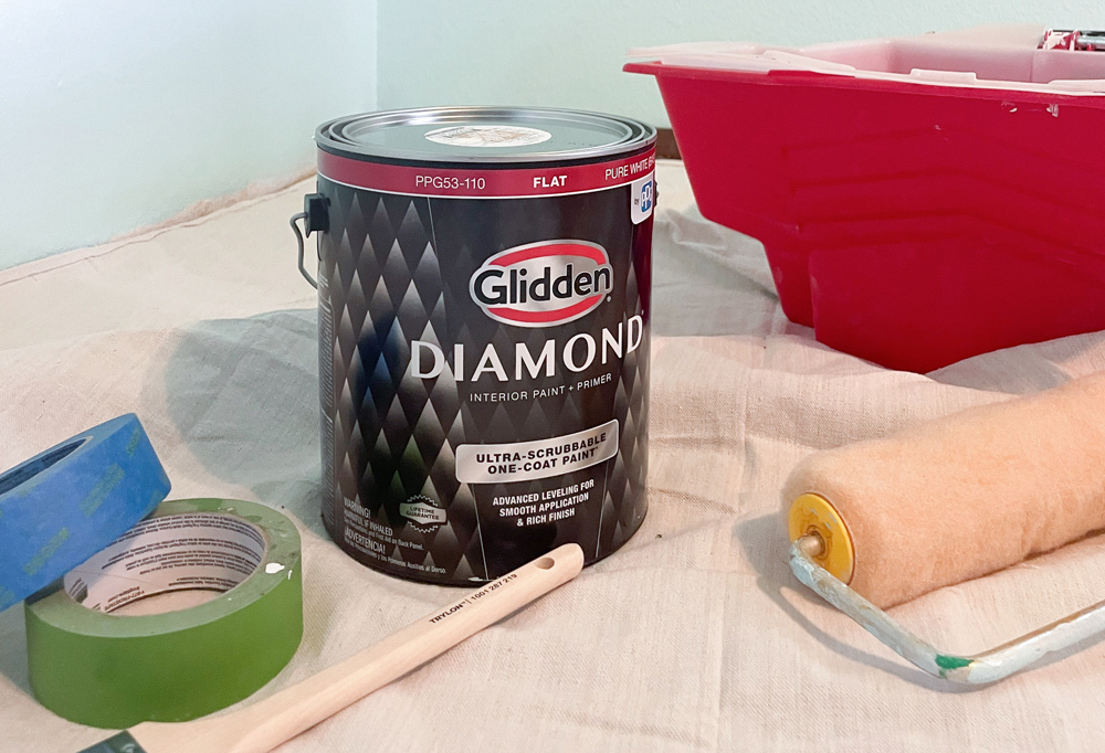 Glidden Diamond paint and the tools used for the project.