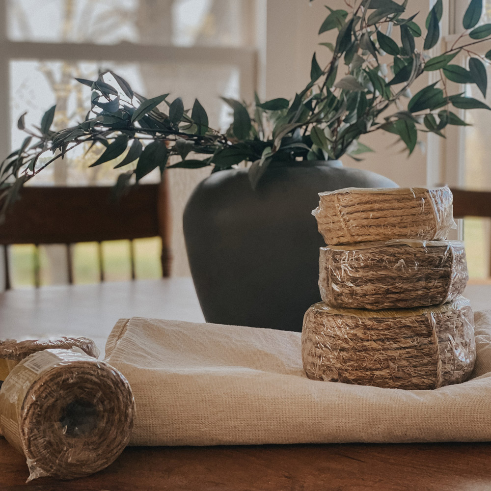 Drop cloth and twine on a table. Drop cloth and twine on a table.