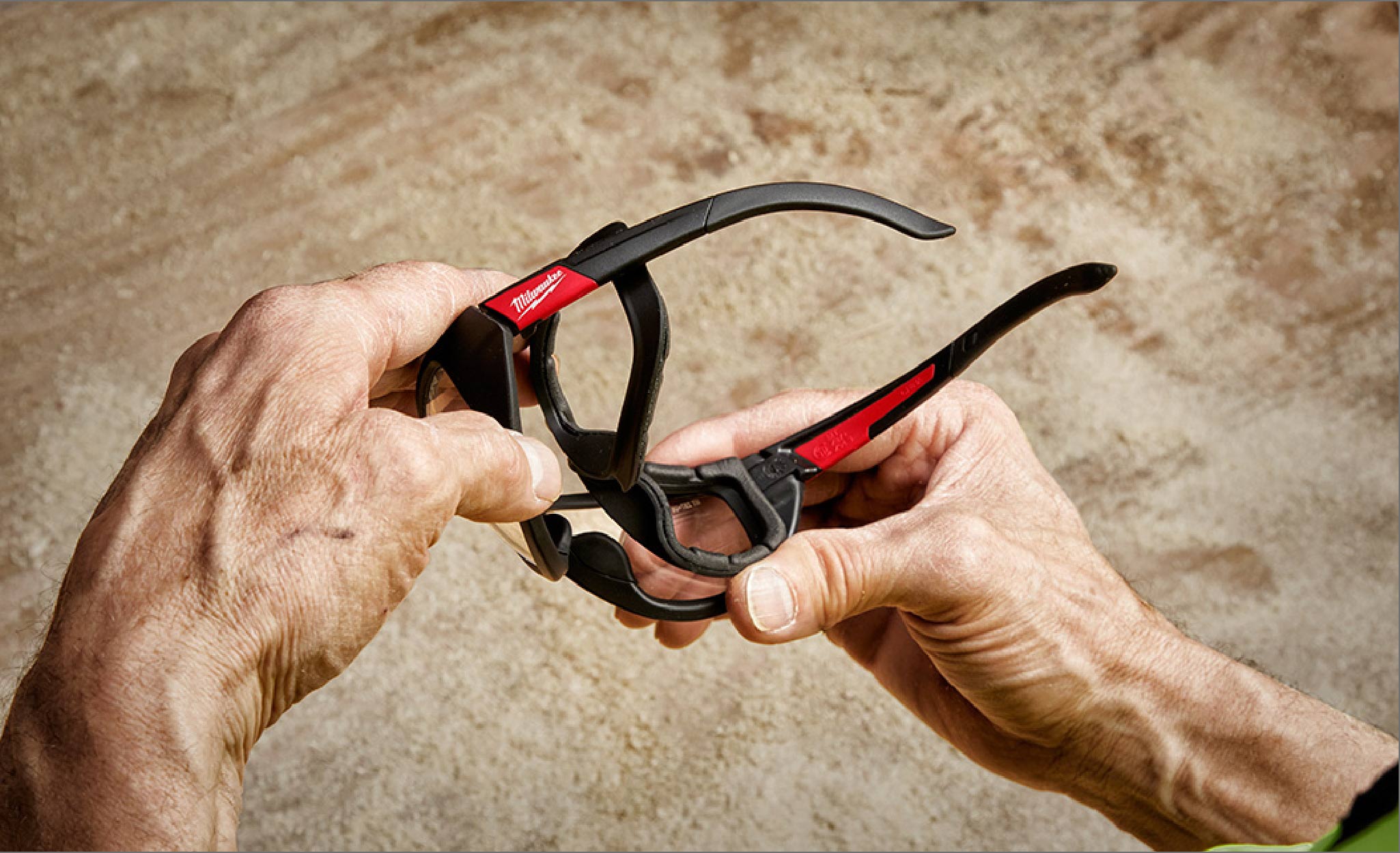 A pair of safety glasses have fog-free lenses.