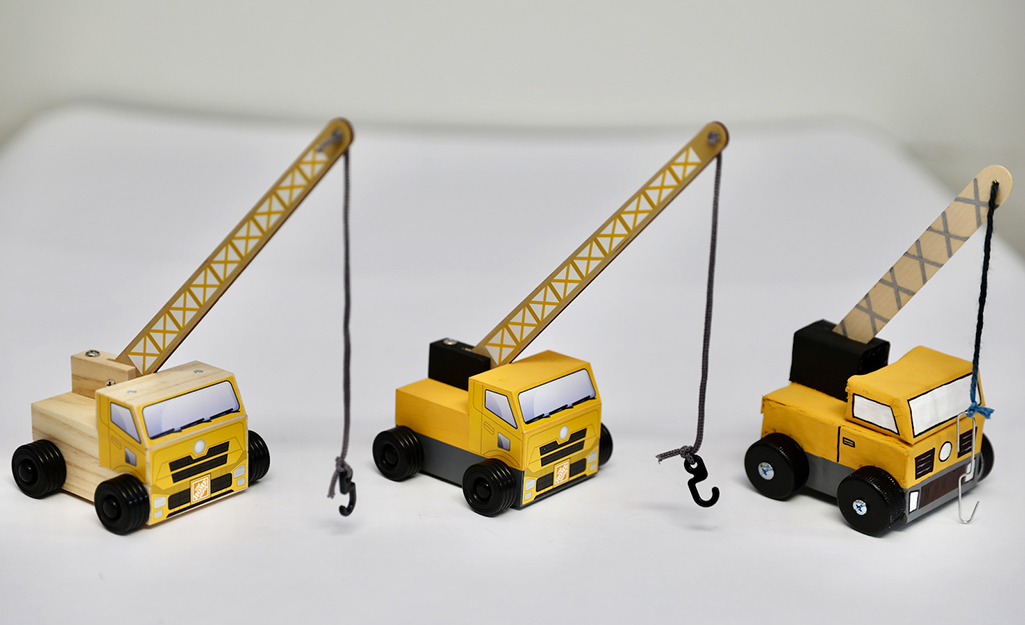 Three versions of the completed crane.