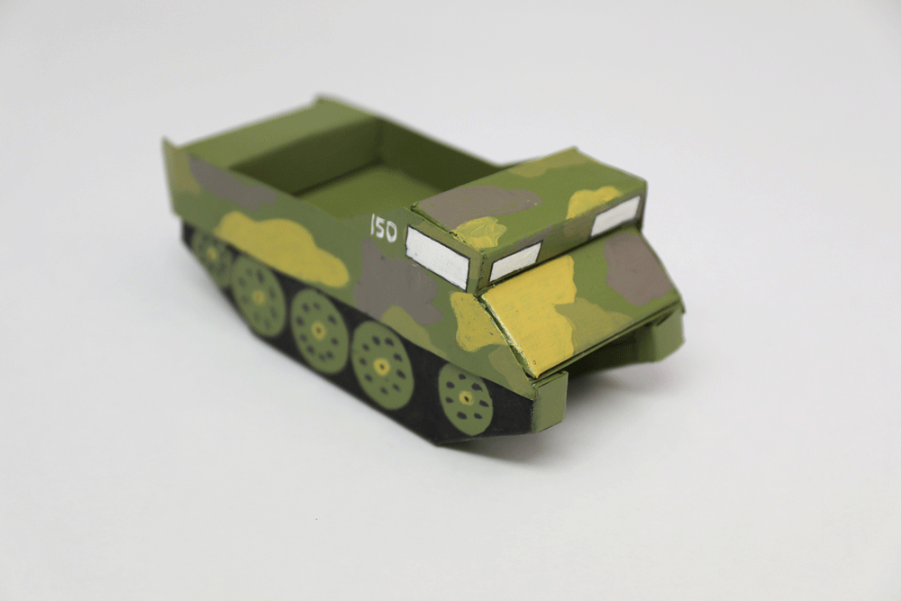 A completed amphibious military vehicle made with cardboard