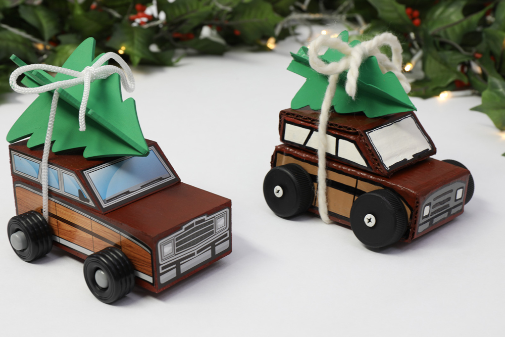 two variations of an assembled cardboard Christmas car