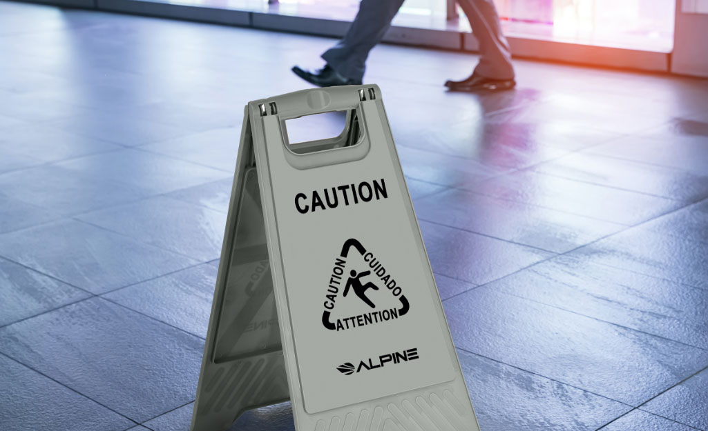 A wet floor sign in a commercial building