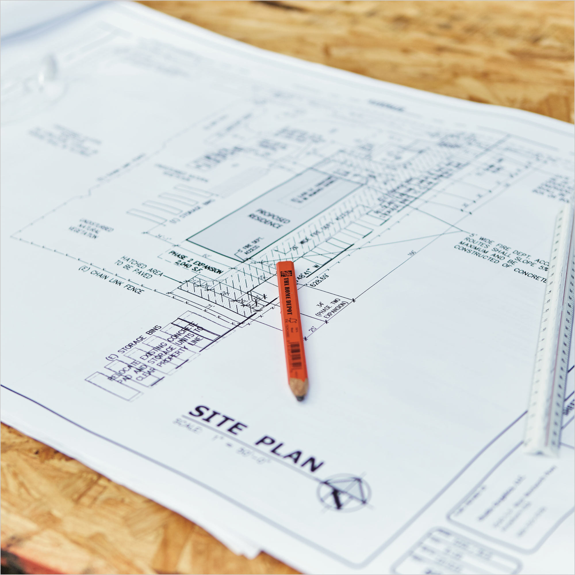 A set of blueprints at a construction site.