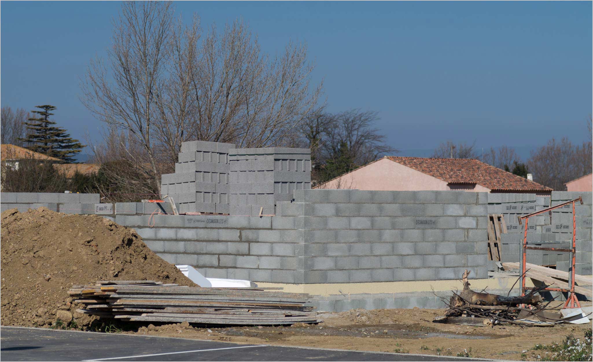 Construction Site With Cinder Block Home