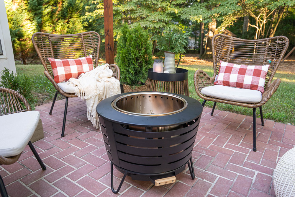 Completed patio setup with fire pit, chairs, and s’mores tray. Completed patio setup with fire pit, chairs, and s’mores tray.
