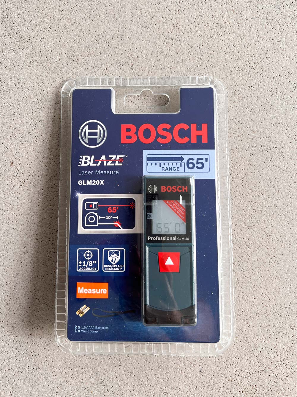 Close up shot of the Blaze laser distance tape measuring tool.