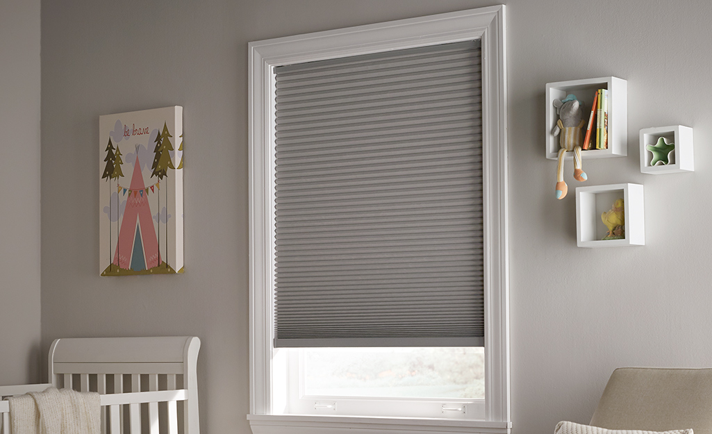 Safety blinds are hung in a nursery. Safety blinds are hung in a nursery.
