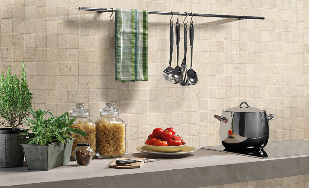 A limestone tile backsplash is an interesting neutral in a home cook's kitchen.