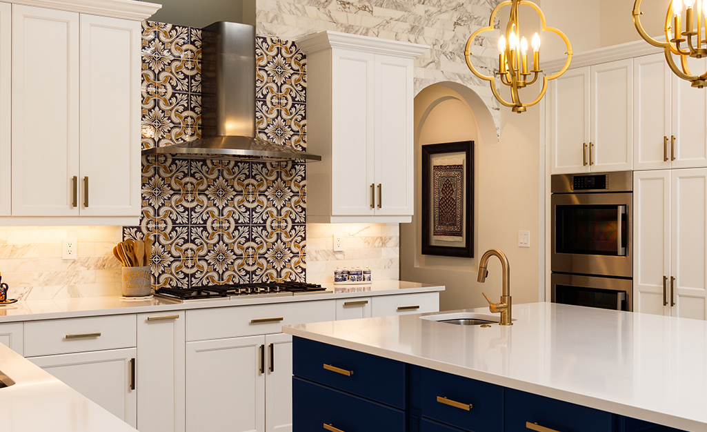 A mosaic backsplash is a gorgeous focal point in an elegant kitchen.