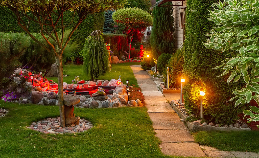 Landscape lighting lining a walkway.