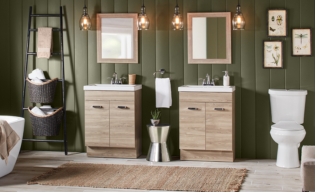 A bathroom with planked paneling installed behind two single vanities.. A bathroom with planked paneling installed behind two single vanities..