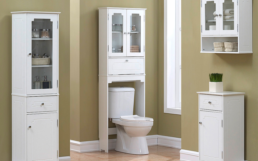 Over-the-toilet shelving unit and cabinets.