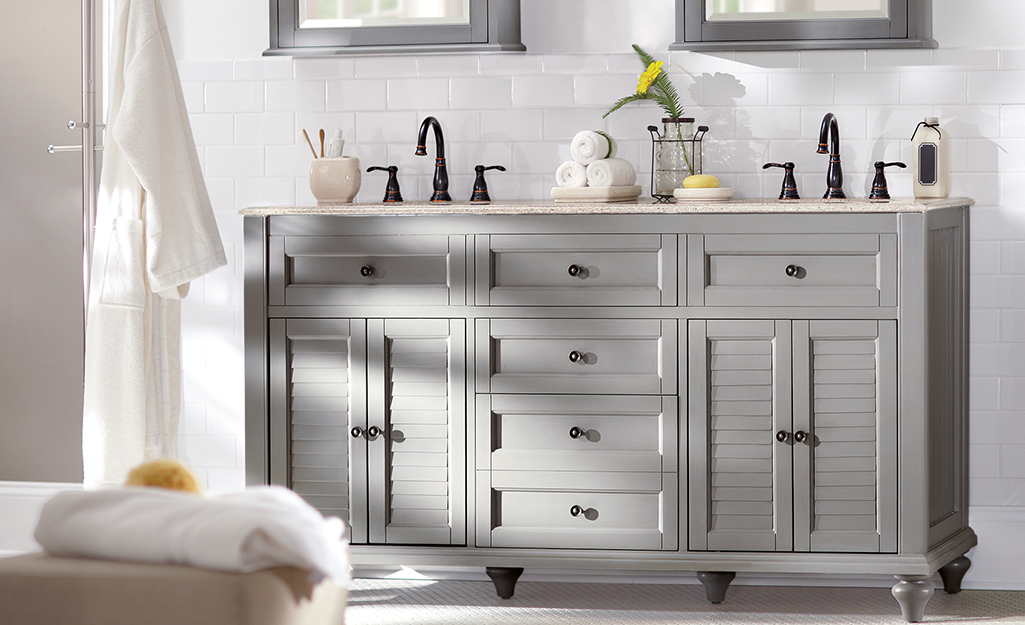 A gray furniture-style double sink vanity.
