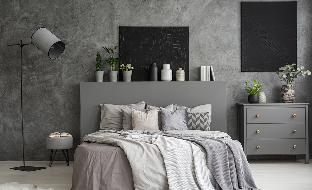 Bedroom with faux finish walls that look marble.