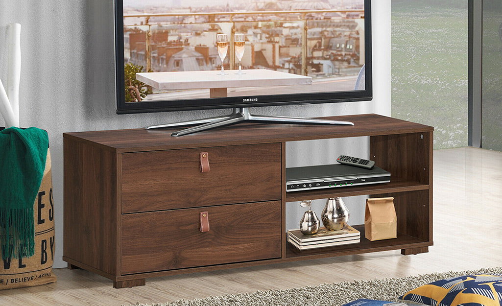 A picture of a TV stand built of solid wood.