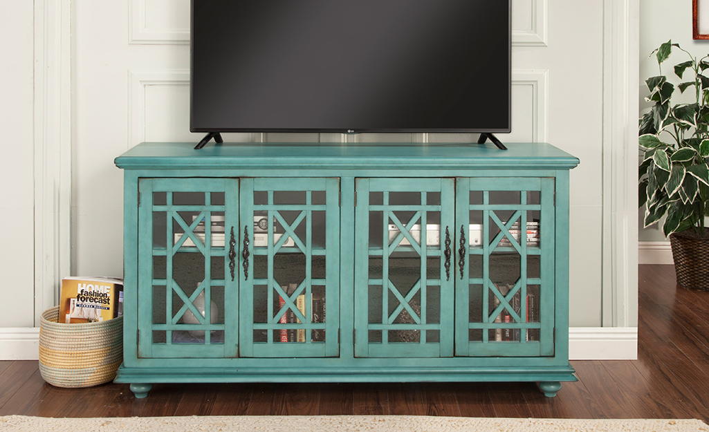 A picture of a rustic-style TV stand.