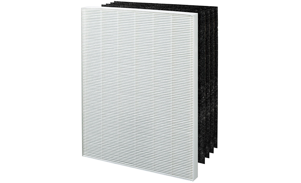 An activated carbon air filter against a white background.