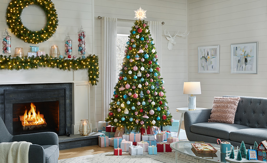 A decorated artificial long needle pine in a holiday living room.