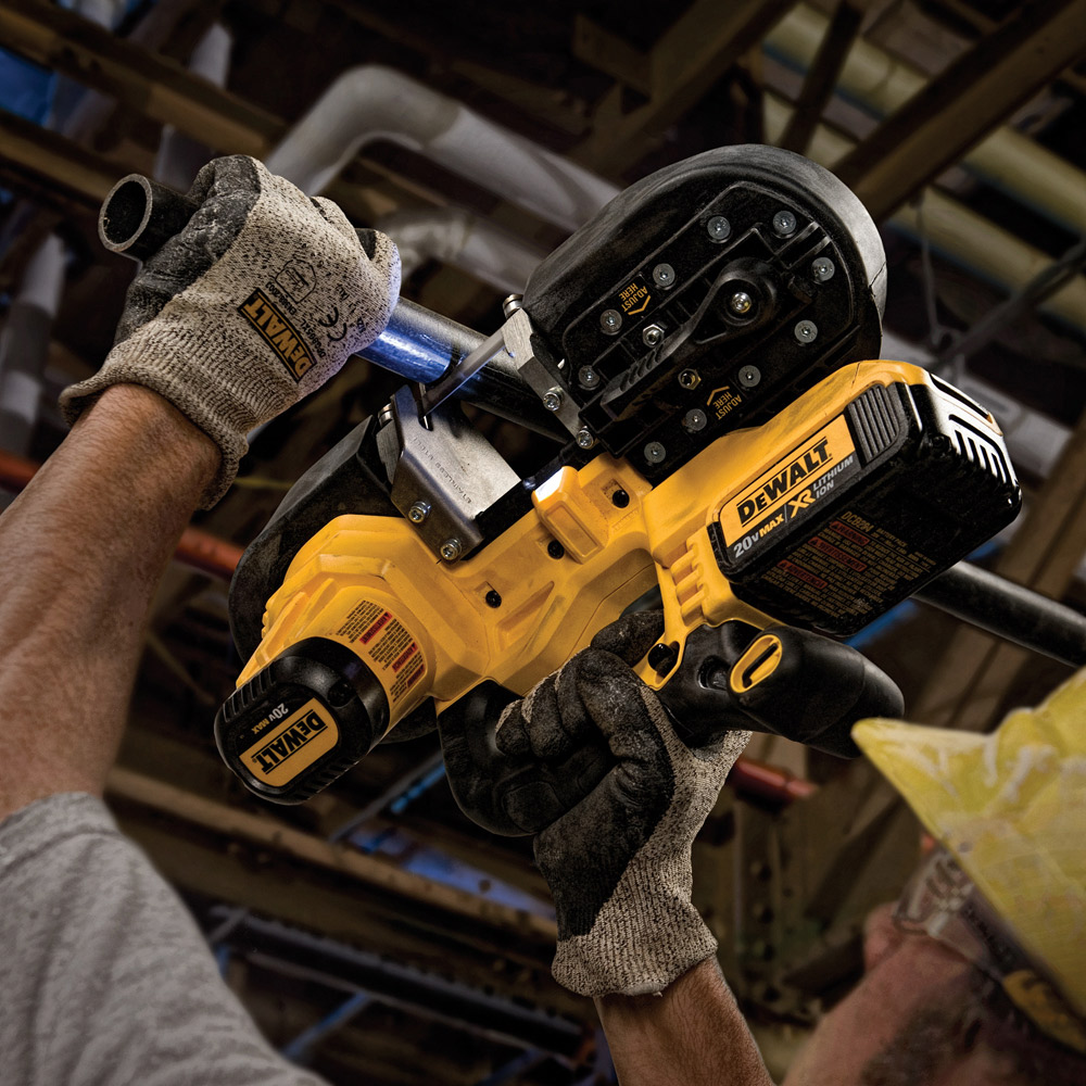 A person holds a band saw.