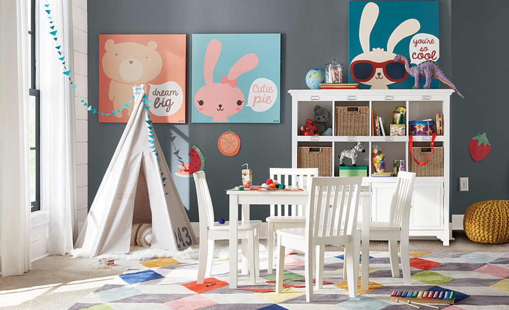 A children's room with furniture and toys.