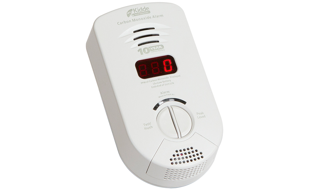 A carbon monoxide alarm with a digital display.