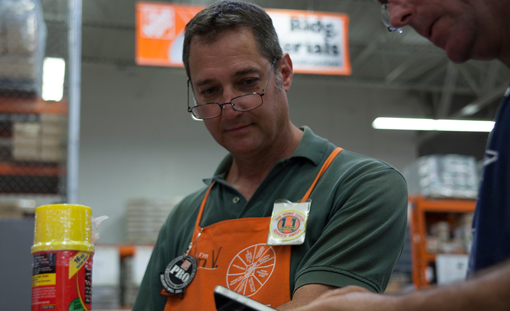 A The Home Depot Store Associate working with a customer.