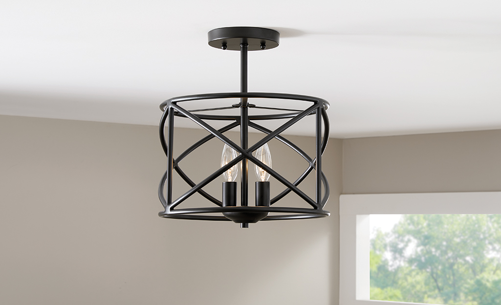 A modern pendant light hangs from the ceiling.