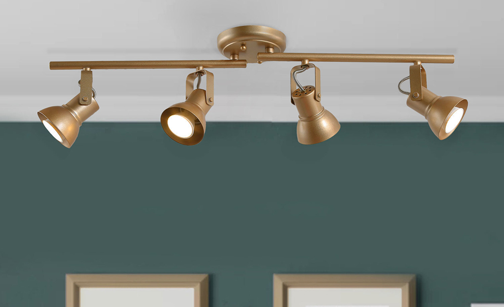 Track lighting in modern gold finish.