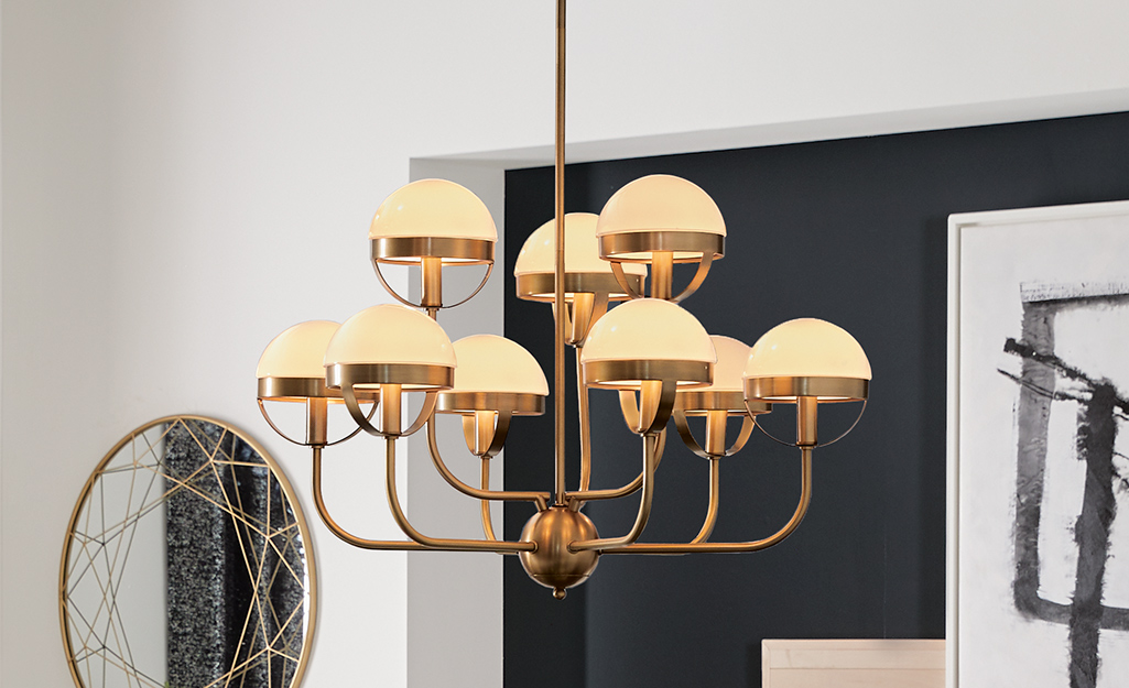 A brass mid-century modern chandelier.