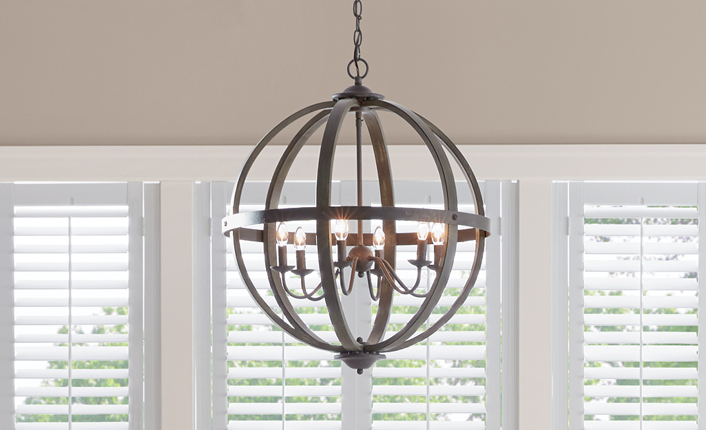 A coastal style cage chandelier.