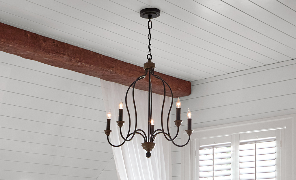 A cottage style candlestick chandelier.