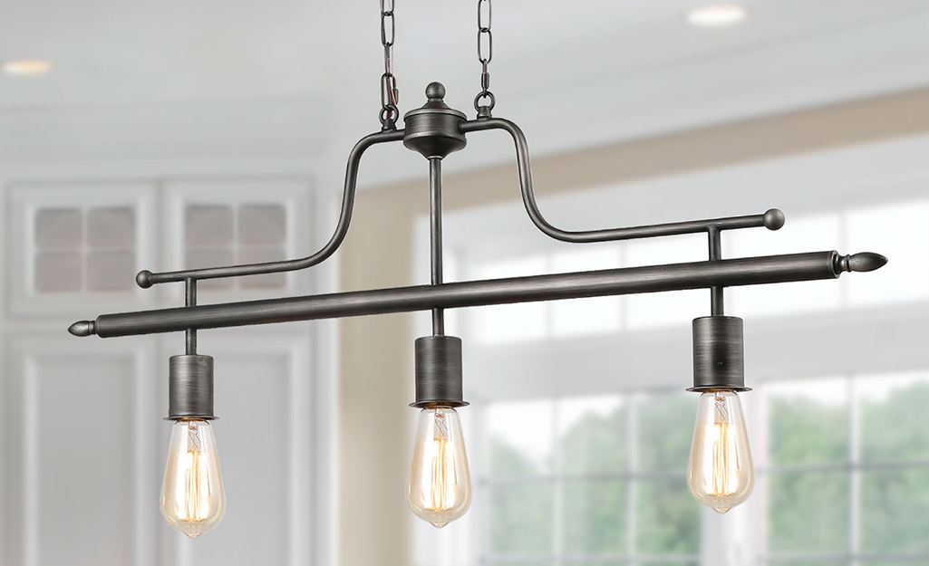 An industrial chandelier with pendant lights.