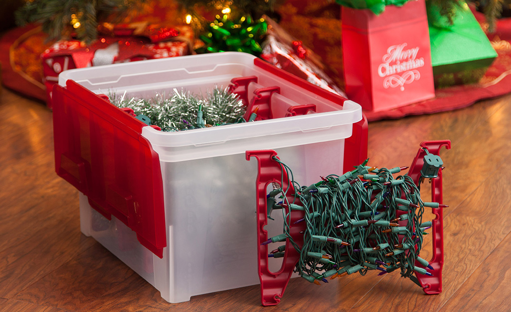 A storage box filled with Christmas lights.