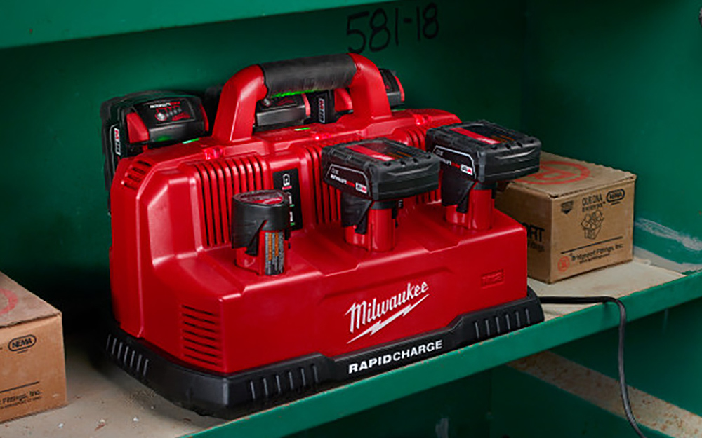 A charging station charging multiple batteries for cordless power tools. A charging station charging multiple batteries for cordless power tools.