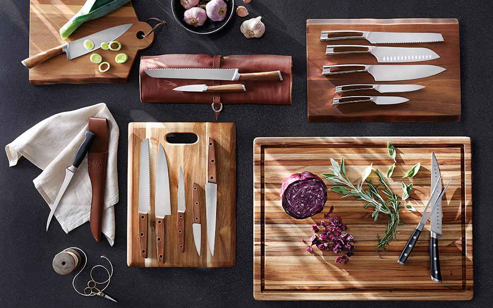 Wood cutting boards with knives.