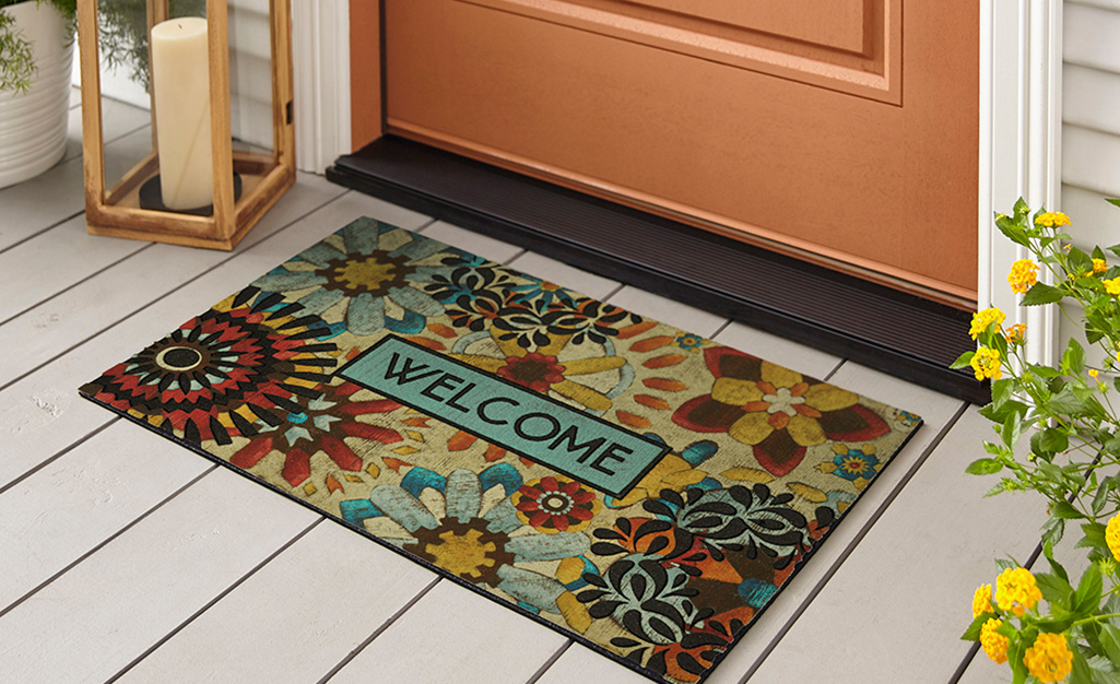 Doormat featuring a bold, colorful design.