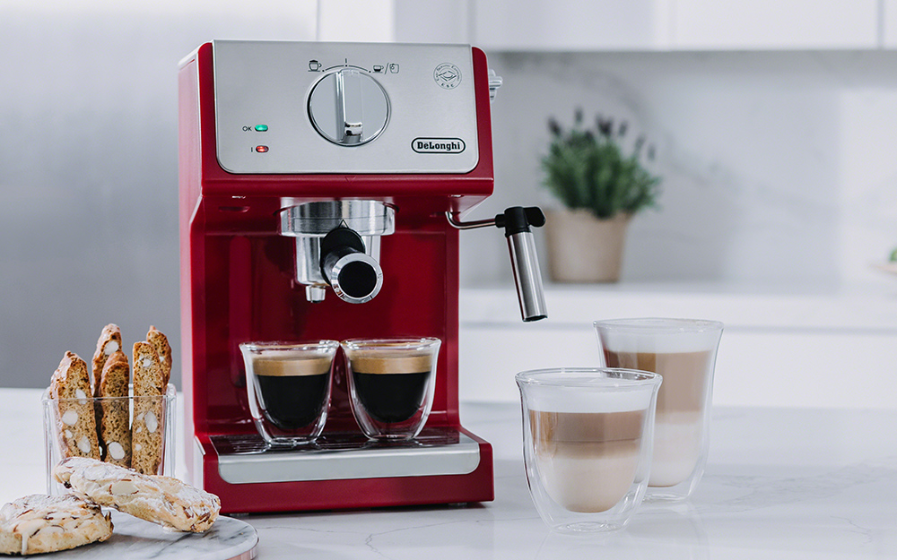 a home espresso machine on a kitchen counter.