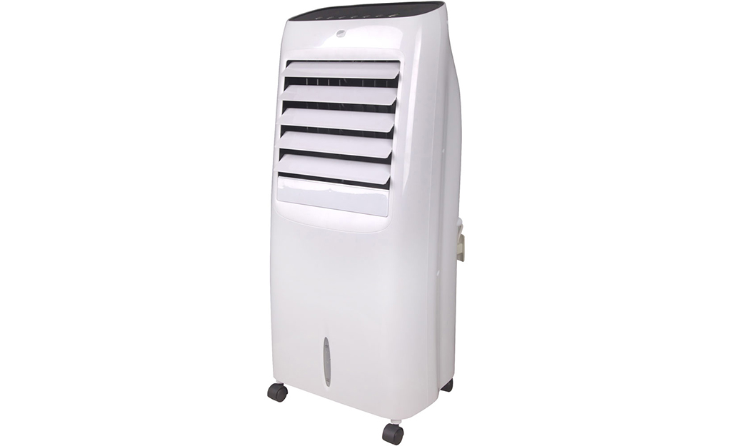 A portable evaporative cooler against a white background.