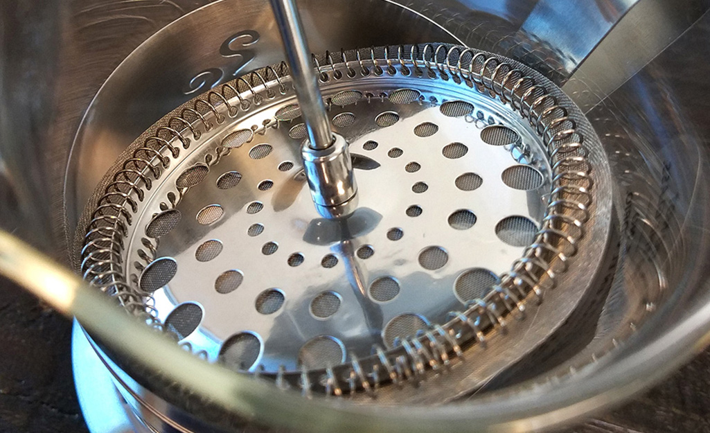 A coffee filter from a French press A coffee filter from a French press