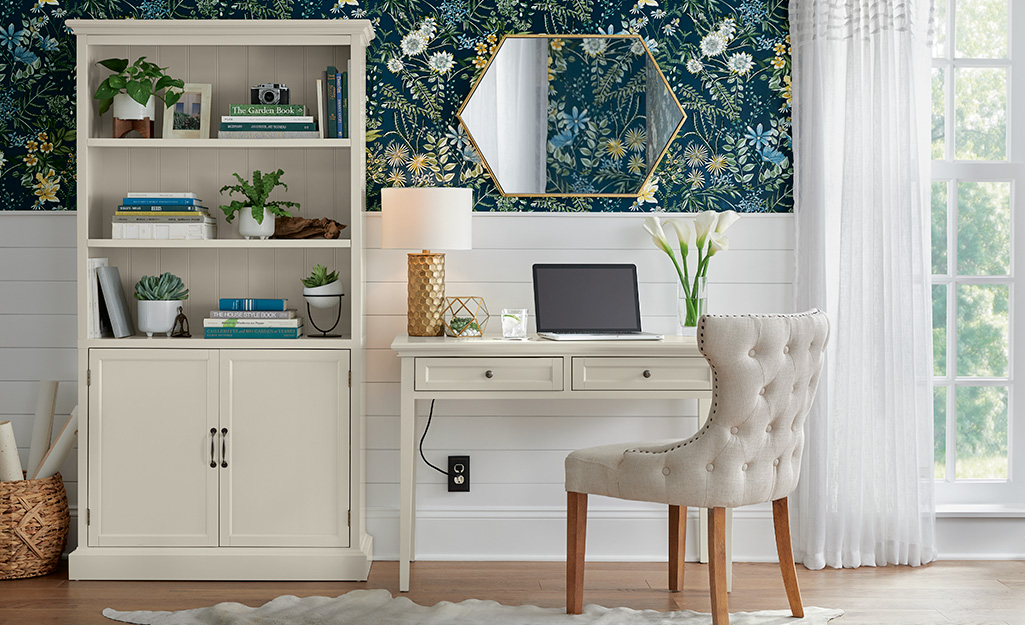 A home office with wallpaper