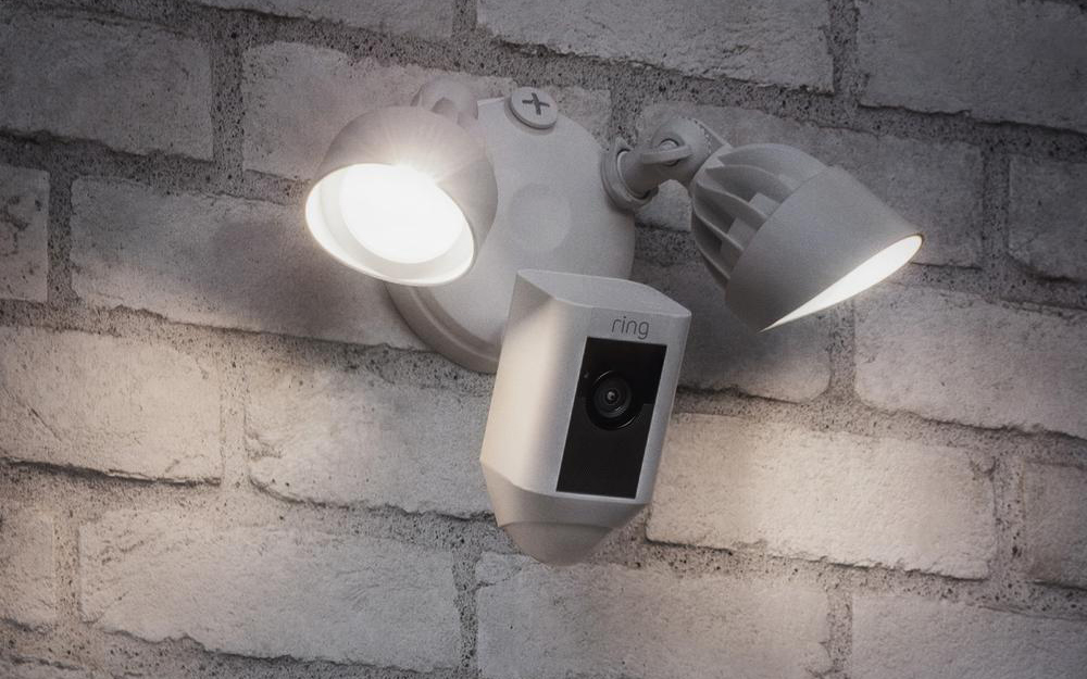 Lights with a motion sensor on an outside wall. Lights with a motion sensor on an outside wall.