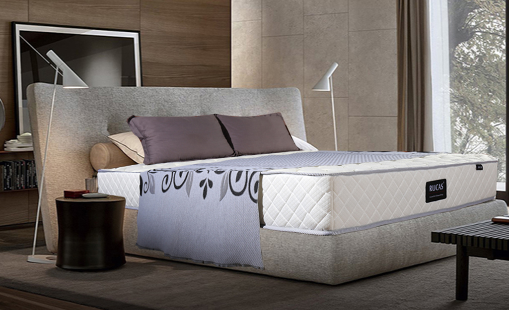 A modern bedroom with a memory foam mattress.