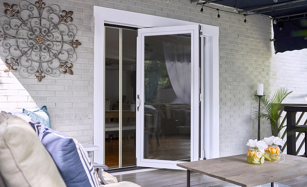 A fiberglass patio door with white trim.