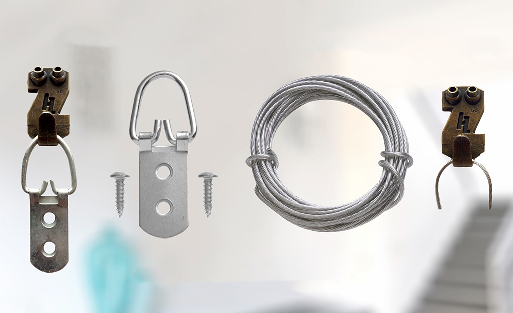 https://contentgrid.homedepot-static.com/hdus/en_US/DTCCOMNEW/Articles/best-picture-and-mirror-hangers-for-your-home-section-2.jpg