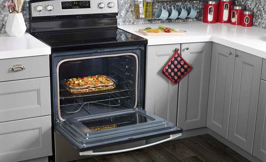 An electric range stove top oven.