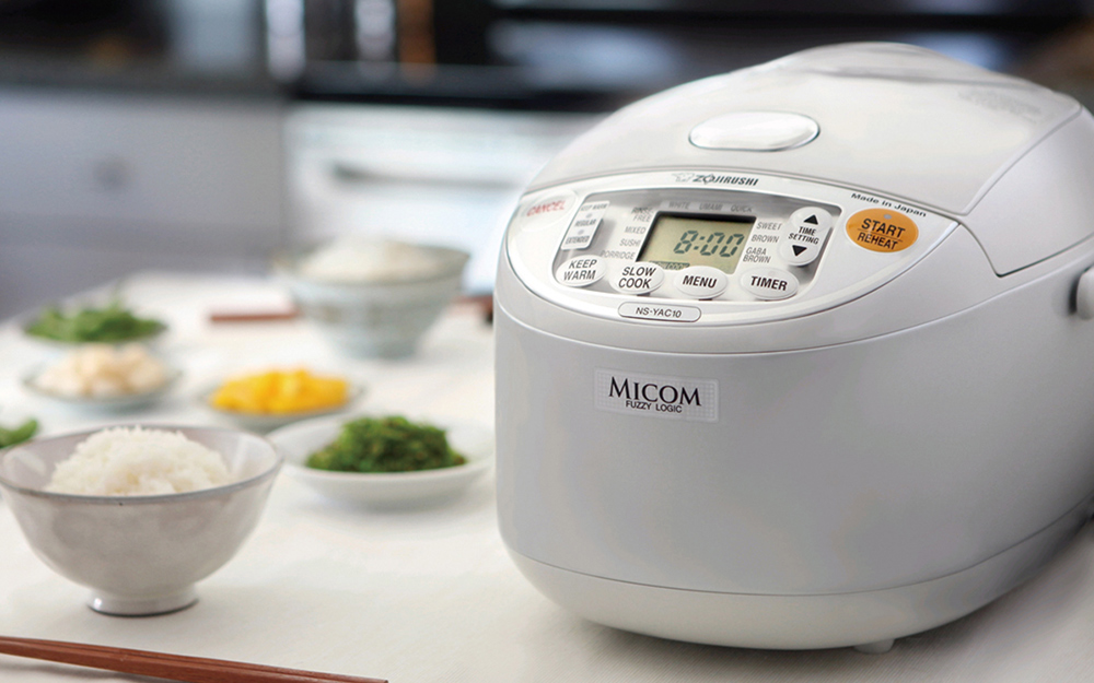 A rice cooker on a kitchen counter