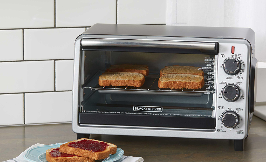 Courant 4-Slice Countertop Toaster Oven with Bake and Broil Functions and  30-Minute Timer in Black TO-942K - The Home Depot