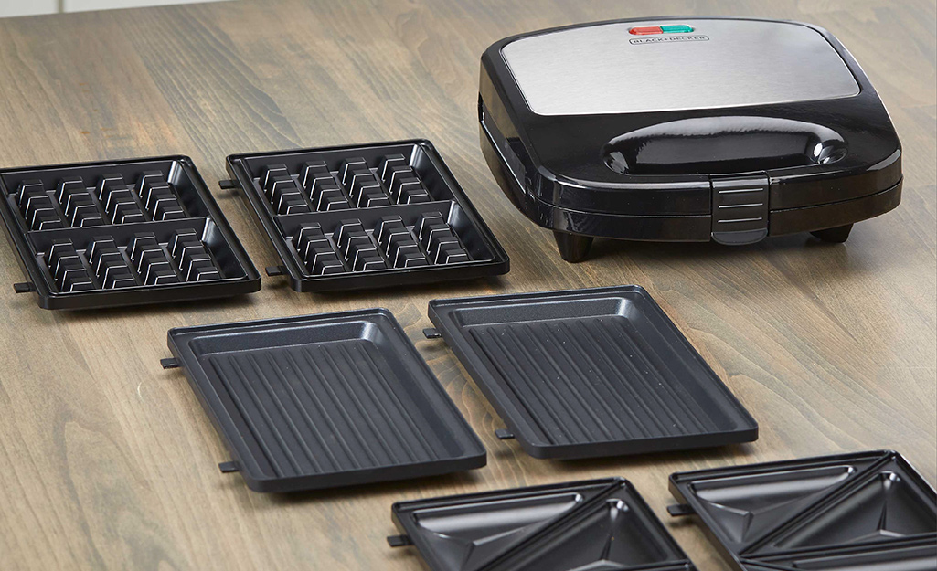 A waffle maker with removable pieces.
